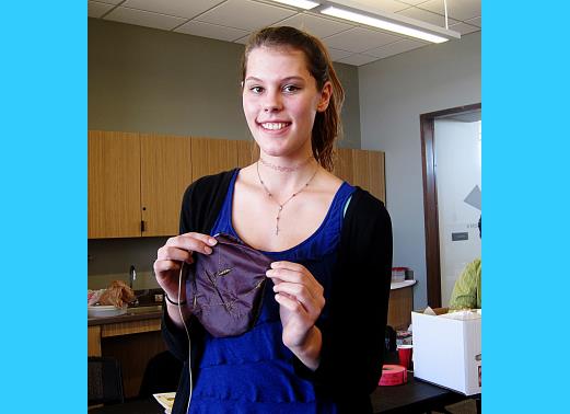 Brianna shows the reticule she made during a recent JASNA New Mexico meeting